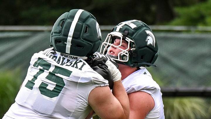 Michigan State’s Conner Moore, right, and Ben Murawski run a drill during football practice on Thursday, Aug. 6, 2026, in East Lansing. Michigan State’s Conner Moore, right, and Ben Murawski run a drill during football practice on Thursday, Aug. 6, 2026, in East Lansing.