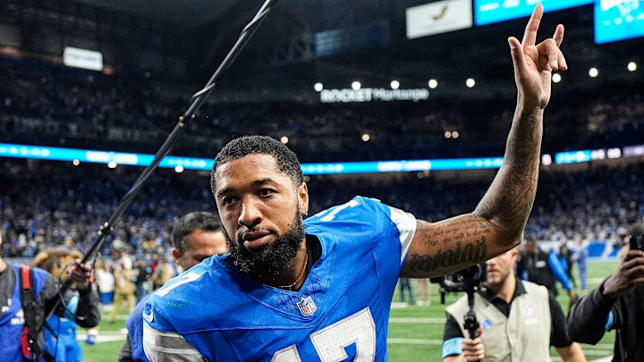 Detroit Lions wide receiver Tim Patrick (17) waves at fans as he exits the field after 34-31 win over Green Bay Packers at Ford Field in Detroit on Thursday, Dec. 5, 2024.