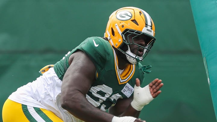 Green Bay Packers defensive lineman Nazir Stackhouse (93) runs through a drill during practice on Wednesday. Green Bay Packers defensive lineman Nazir Stackhouse (93) runs through a drill during practice on Wednesday.