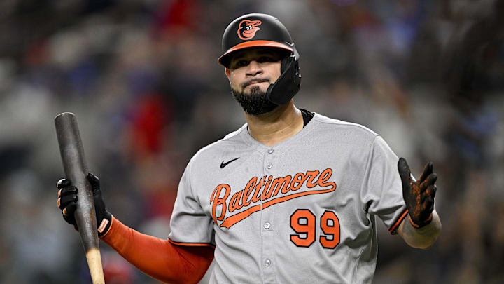 Jun 30, 2025; Arlington, Texas, USA; Baltimore Orioles designated hitter Gary Sanchez (99) reacts to striking out to end the inning against the Texas Rangers during the seventh inning at Globe Life Field. 
