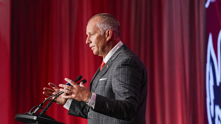 Jul 25, 2024; Charlotte, NC, USA;  North Carolina State Wolfpack head coach Dave Doeren speaks to the media during the ACC Kickoff at Hilton Charlotte Uptown. Mandatory Credit: Jim Dedmon-Imagn Images