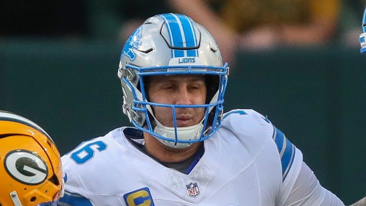 Green Bay Packers defensive tackle Devonte Wyatt (95) sacks Detroit Lions quarterback Jared Goff (16).