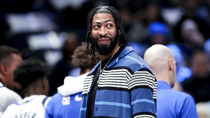 Feb 27, 2025; Dallas, Texas, USA;  Dallas Mavericks forward Anthony Davis laughs during a timeout against the Charlotte Hornets during the first half at American Airlines Center. Mandatory Credit: Kevin Jairaj-Imagn Images