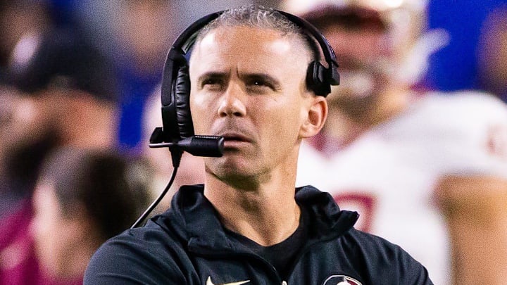 Florida State Seminoles head coach Mike Norvell looks to the replay screen at Steve Spurrier Field at Ben Hill Griffin Stadium in Gainesville, FL on Saturday, November 25, 2023 during the first half. [Doug Engle/Gainesville Sun]