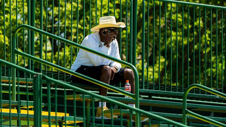 Deion Sanders takes in the second day of Cleveland Browns training camp, July 30, 2026, in Berea, Ohio.