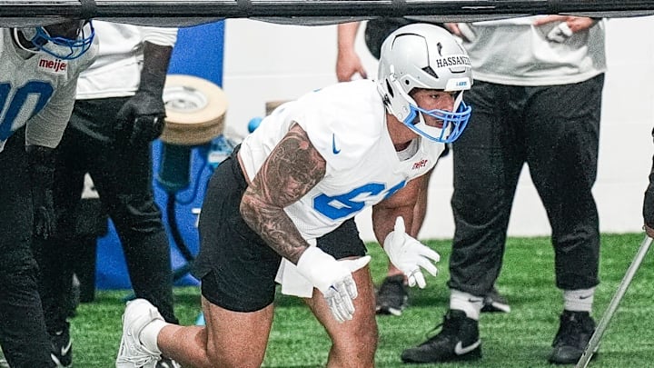 Detroit Lions defensive end Ahmed Hassanein (61) practices during OTA at team's Performance Center Detroit Lions defensive end Ahmed Hassanein (61) practices during OTA at team's Performance Center