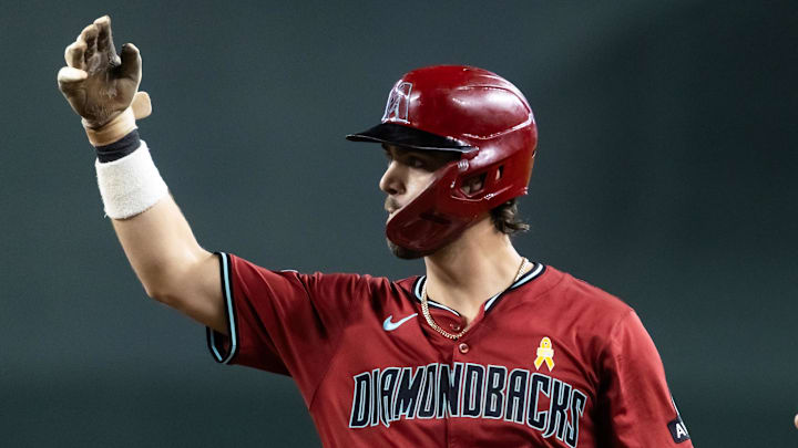 Sep 7, 2025; Phoenix, Arizona, USA; Arizona Diamondbacks infielder Blaze Alexander celebrates after hitting an RBI single in the second inning against the Boston Red Sox at Chase Field. Mandatory Credit: Mark J. Rebilas-Imagn Images