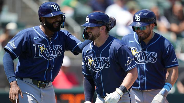 Aug 12, 2026; West Sacramento, California, USA; Tampa Bay Rays catcher Liam Hicks (34) is congratulated by third baseman Junior Caminero (13) after hitting a three-run home run against the Athletics in the fourth inning at Sutter Health Park. Mandatory Credit: Cary Edmondson-Imagn Images Aug 12, 2026; West Sacramento, California, USA; Tampa Bay Rays catcher Liam Hicks (34) is congratulated by third baseman Junior Caminero (13) after hitting a three-run home run against the Athletics in the fourth inning at Sutter Health Park. Mandatory Credit: Cary Edmondson-Imagn Images