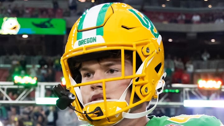 Jan 1, 2024; Glendale, AZ, USA; Oregon Ducks tight end Zach Grace (44) against the Liberty Flames during the 2024 Fiesta Bowl at State Farm Stadium. 