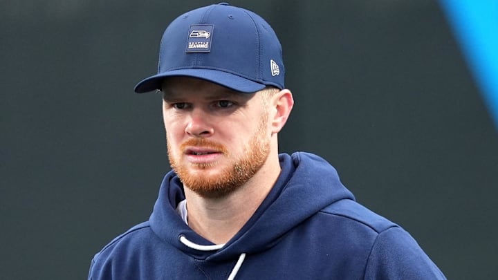 Dec 28, 2025; Charlotte, North Carolina, USA; Seattle Seahawks quarterback Sam Darnold (14) warms up before the game against the Carolina Panthers at Bank of America Stadium. Mandatory Credit: Jim Dedmon-Imagn Images