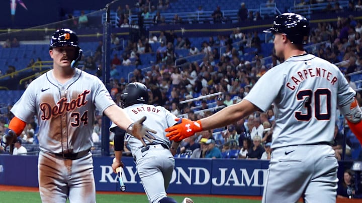 Jake Rogers is congratulated by Kerry Carpenter Jake Rogers is congratulated by Kerry Carpenter
