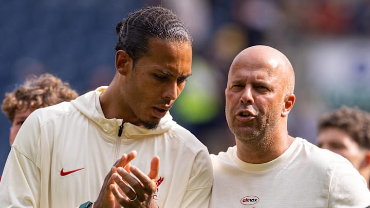 Virgil van Dijk (left) missed both games against Athletic Club at Anfield.