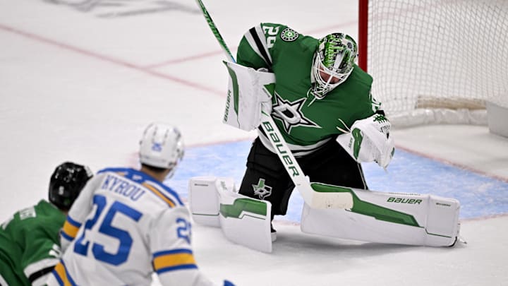 Feb 4, 2026; Dallas, Texas, USA; Dallas Stars goaltender Jake Oettinger (29) stops a shot by St. Louis Blues right wing Jordan Kyrou (25) during the third period at the American Airlines Center. Mandatory Credit: Jerome Miron-Imagn Images