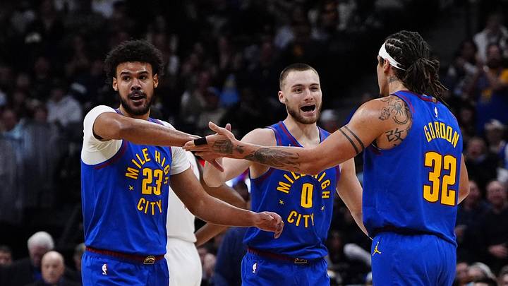 Mar 11, 2026; Denver, Colorado, USA; Denver Nuggets forward Cameron Johnson (23), guard Christian Braun (0) and forward Aaron Gordon (32) reacts in the third quarter against the Houston Rockets at Ball Arena. Mar 11, 2026; Denver, Colorado, USA; Denver Nuggets forward Cameron Johnson (23), guard Christian Braun (0) and forward Aaron Gordon (32) reacts in the third quarter against the Houston Rockets at Ball Arena.
