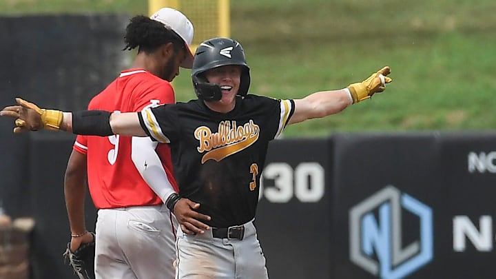 Bettendorf senior Wrigley Matthys (3) celebrates stealing third base during the Iowa high school state championship on Friday, July 25, 2025, at Lewis & Clark Park in Sioux City, Iowa.
