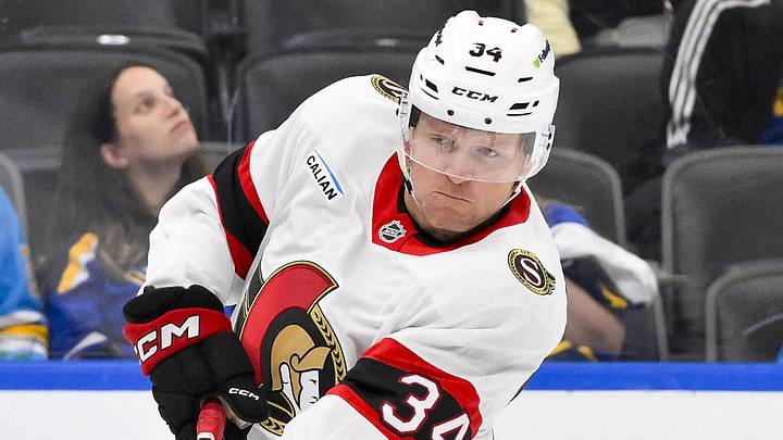 Oct 2, 2025; St. Louis, Missouri, USA; Ottawa Senators right wing Arthur Kaliyev (34) shoots against the St. Louis Blues during the third period at Enterprise Center. Mandatory Credit: Jeff Curry-Imagn Images