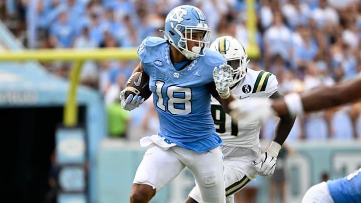 Sep 7, 2024; Chapel Hill, North Carolina, USA; North Carolina Tar Heels tight end Bryson Nesbit (18) with the ball in the second quarter at Kenan Memorial Stadium. Mandatory Credit: Bob Donnan-Imagn Images Sep 7, 2024; Chapel Hill, North Carolina, USA; North Carolina Tar Heels tight end Bryson Nesbit (18) with the ball in the second quarter at Kenan Memorial Stadium. Mandatory Credit: Bob Donnan-Imagn Images
