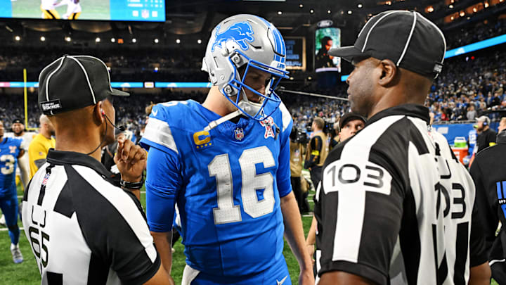 Detroit Lions quarterback Jared Goff (16) speaks with officials after the game at Ford Field