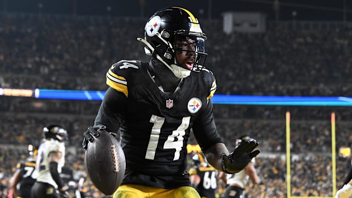 Jan 4, 2026; Pittsburgh, Pennsylvania, USA; Pittsburgh Steelers running back Kenneth Gainwell (14) rushes for a touchdown against the Baltimore Ravens during the second half at Acrisure Stadium. Mandatory Credit: Barry Reeger-Imagn Images