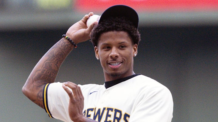 Green Bay Packers wide receiver Matthew Golden throws out a first pitch before a Milwaukee Brewers game.