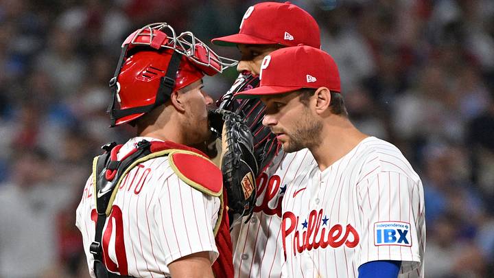 Jul 26, 2026; Philadelphia, Pennsylvania, USA; Philadelphia Phillies catcher J.T. Realmuto (10) speaks with pitcher Cristopher Sánchez (61) and  shortstop Trea Turner (7) during the fifth inning against the New York Yankees at Citizens Bank Park. Mandatory Credit: Eric Hartline-Imagn Images