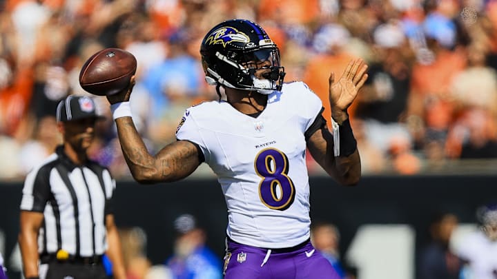 Oct 6, 2024; Cincinnati, Ohio, USA; Baltimore Ravens quarterback Lamar Jackson (8) throws a pass against the Cincinnati Bengals in the first half at Paycor Stadium. Mandatory Credit: Katie Stratman-Imagn Images