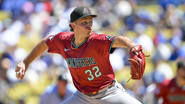 Aug 31, 2025; Los Angeles, California, USA; Arizona Diamondbacks starting pitcher Brandon Pfaadt (32) pitches during the first inning at Dodger Stadium. Mandatory Credit: Jayne Kamin-Oncea-Imagn Images
