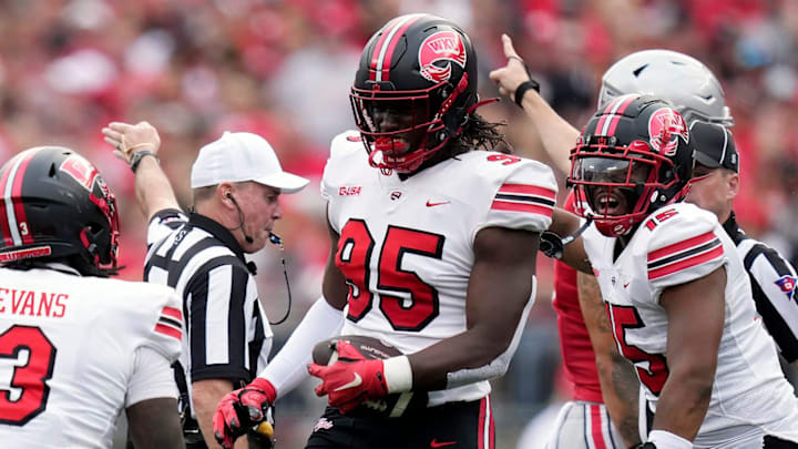 Sep 16, 2023; Columbus, Ohio, USA; Western Kentucky Hilltoppers defensive end Deante McCray (95) celebrates after recovering Ohio State Buckeyes quarterback Kyle McCord (6) fumble during the first quarter of their game at Ohio Stadium.