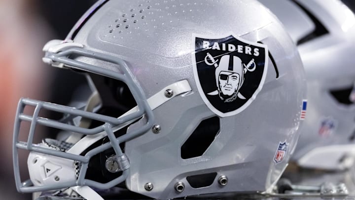 Aug 23, 2025; Glendale, Arizona, USA; Detailed view of a Las Vegas Raiders helmet during a preseason NFL game at State Farm Stadium. Mandatory Credit: Mark J. Rebilas-Imagn Images