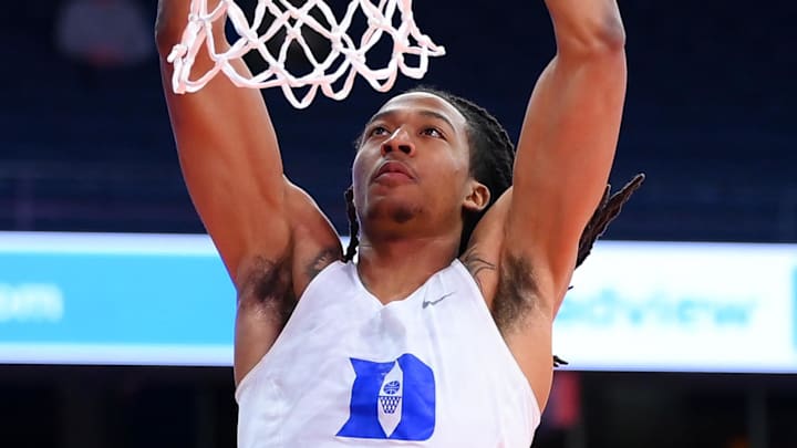 Duke forward Maliq Brown warms up before a game.