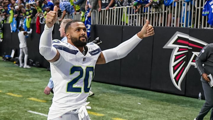 Oct 20, 2024; Atlanta, Georgia, USA; Seattle Seahawks safety Julian Love (20) reacts after the Seahawks defeated the Atlanta Falcons at Mercedes-Benz Stadium.