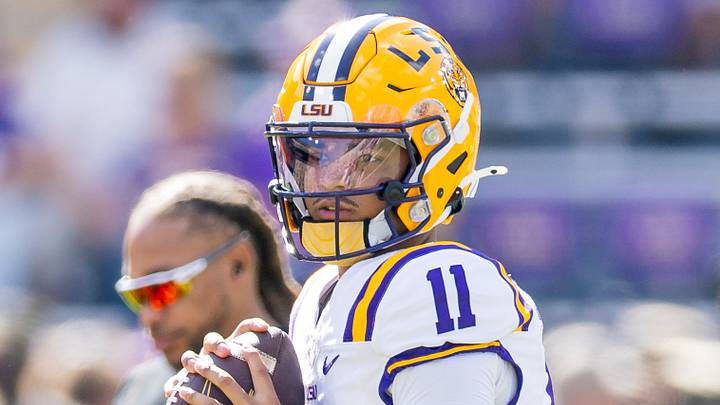 LSU Tigers quarterback Michael Van Buren Jr. (11) passes the ball during warm ups before the game against the Arkansas Razorbacks at Tiger Stadium. LSU Tigers quarterback Michael Van Buren Jr. (11) passes the ball during warm ups before the game against the Arkansas Razorbacks at Tiger Stadium.