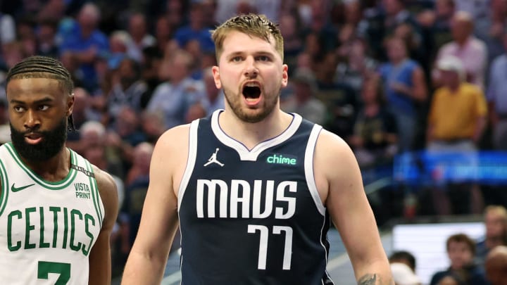 Jun 12, 2024; Dallas, Texas, USA; Dallas Mavericks guard Luka Doncic (77) reacts after a play against the Boston Celtics during the fourth quarter during game three of the 2024 NBA Finals at American Airlines Center. Mandatory Credit: Kevin Jairaj-USA TODAY Sports Jun 12, 2024; Dallas, Texas, USA; Dallas Mavericks guard Luka Doncic (77) reacts after a play against the Boston Celtics during the fourth quarter during game three of the 2024 NBA Finals at American Airlines Center. Mandatory Credit: Kevin Jairaj-USA TODAY Sports