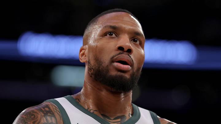 Milwaukee Bucks guard Damian Lillard (0) reacts during the second quarter against the New York Knicks at Madison Square Garden on November 8, 2024.