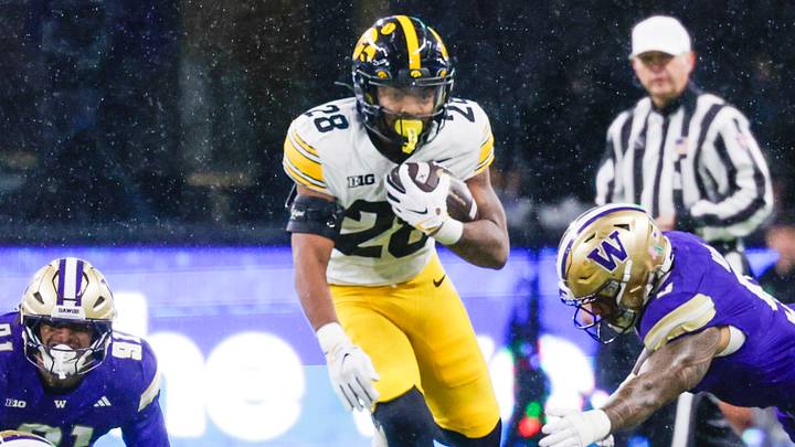 Oct 9, 2026; Seattle, Washington, USA; Iowa Hawkeyes running back Kamari Moulton (28) rushes against the Washington Huskies during the second quarter at Husky Stadium. Mandatory Credit: Joe Nicholson-Imagn Images