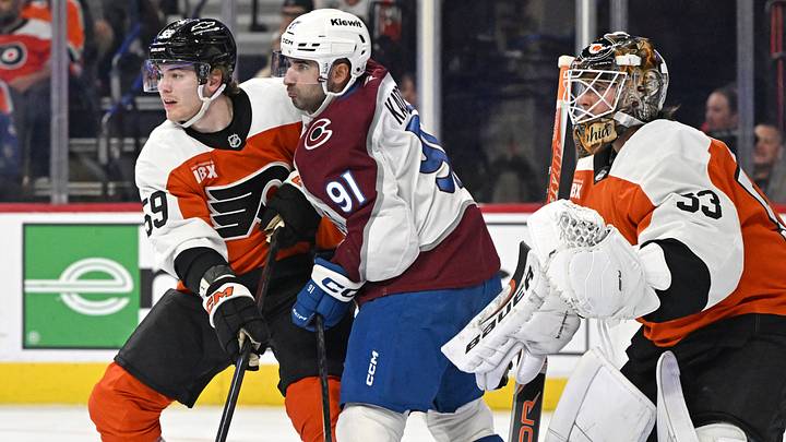 Oct 19, 2026; Philadelphia, Pennsylvania, USA; Philadelphia Flyers defenseman Oliver Bonk (59) and Colorado Avalanche center Nazem Kadri (91) battle for position in front of goaltender Joseph Woll (53) during the second period at Xfinity Mobile Arena. Mandatory Credit: Eric Hartline-Imagn Images Oct 19, 2026; Philadelphia, Pennsylvania, USA; Philadelphia Flyers defenseman Oliver Bonk (59) and Colorado Avalanche center Nazem Kadri (91) battle for position in front of goaltender Joseph Woll (53) during the second period at Xfinity Mobile Arena. Mandatory Credit: Eric Hartline-Imagn Images