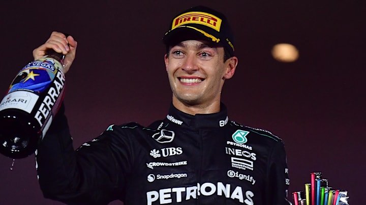 Nov 23, 2024; Las Vegas, Nevada, USA; Mercedes AMG Petronas driver George Russell (63) celebrates his race victory of the Las Vegas Grand Prix at Las Vegas Circuit. Mandatory Credit: Gary A. Vasquez-Imagn Images