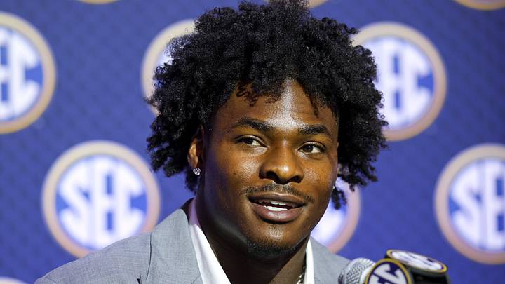 Texas Longhorns defensive end Colin Simmons speaks to the press during SEC Football Kickoff Media Day Texas Longhorns defensive end Colin Simmons speaks to the press during SEC Football Kickoff Media Day