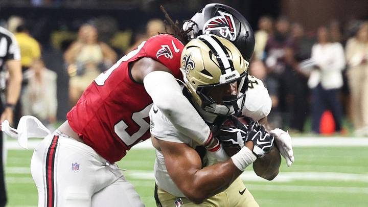 Atlanta Falcons linebacker Kendal Daniels tackles New Orleans Saints running back CJ Donaldson