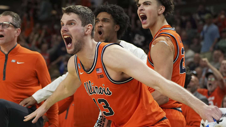 Mar 21, 2026; Greenville, SC, USA; The Illinois Fighting Illini center Tomislav Ivisic (13) reacts after a play during the second half against the VCU Rams during a second round game of the men's 2026 NCAA Tournament at Bon Secours Wellness Arena. Mandatory Credit: Bob Donnan-Imagn Images