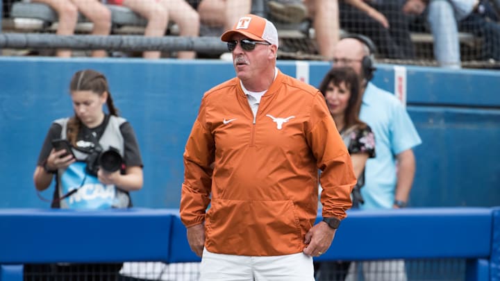 Texas Longhorns head coach Mike White look on in the sixth inning against the Florida Gators