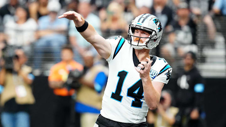 Sep 22, 2024; Paradise, Nevada, USA; Carolina Panthers quarterback Andy Dalton (14) makes a pass attempt against the Las Vegas Raiders during the second quarter at Allegiant Stadium. Mandatory Credit: Stephen R. Sylvanie-Imagn Images