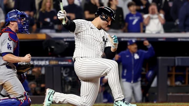 Oct 30, 2024; New York, New York, USA; New York Yankees first baseman Anthony Rizzo (48) strikes out in front of Los Angeles Dodgers catcher Will Smith (16) to end the eighth inning in game five of the 2024 MLB World Series at Yankee Stadium. 