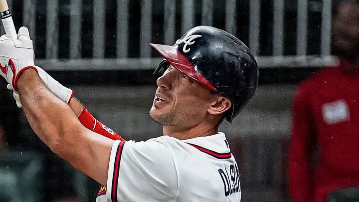 Aug 6, 2026; Cumberland, Georgia, USA; Atlanta Braves first baseman Matt Olson (28) hits a home run against the Miami Marlins during the sixth inning at Truist Park. Mandatory Credit: Dale Zanine-Imagn Images