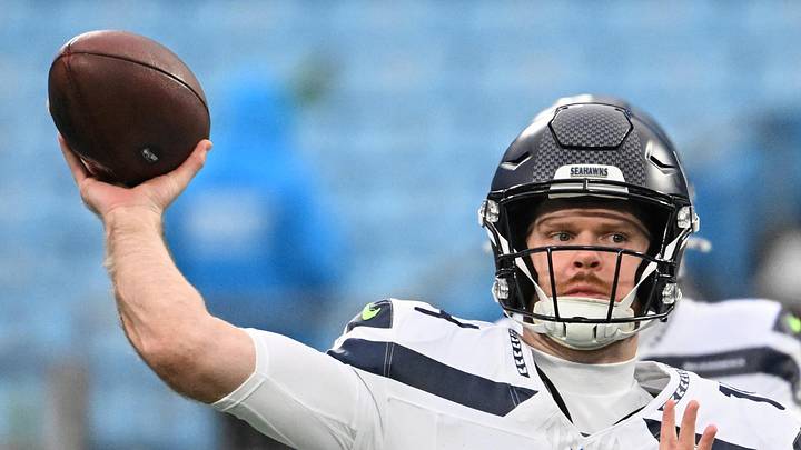 Seattle Seahawks quarterback Sam Darnold throws a pass during warmups before the game against the Carolina Panthers.