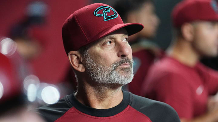 Arizona Diamondbacks manager Torey Lovullo watches his team from the dugout as they play the Seattle Mariners at Chase Field in Phoenix on June 10, 2025.