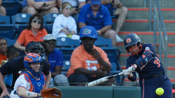 Auburn infielder Destiny Rodriguez (34) hits durning an NCAA softball game at Katie Seashole Pressly Stadium in Gainesville, FL on Friday, April 17, 2026. [Alan Youngblood/Gainesville Sun]