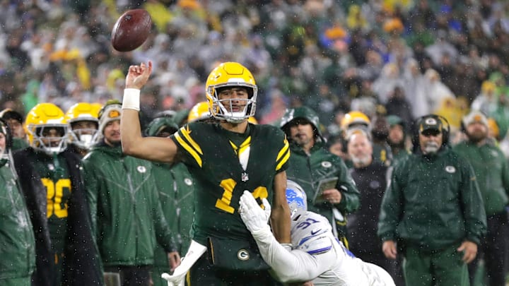 Green Bay Packers quarterback Jordan Love is pressured by the Detroit Lions last season.