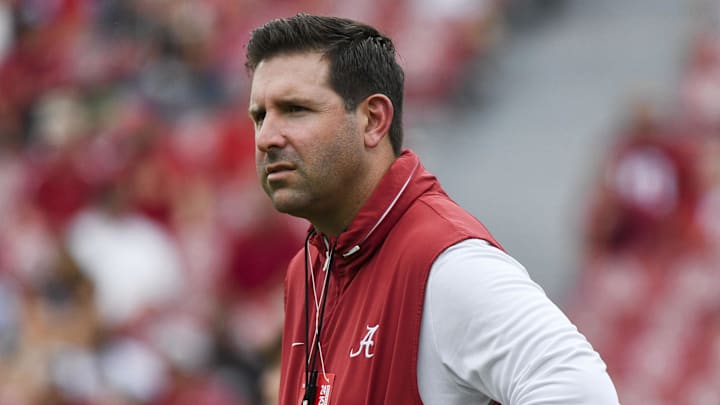 Sep 7, 2024; Tuscaloosa, Alabama, USA;  Alabama offensive coordinator and quarterbacks coach Nick Sheridan watches his quarterbacks warm up at Bryant-Denny Stadium before a game against the South Florida Bulls. Mandatory Credit: Gary Cosby Jr.-Imagn Images
