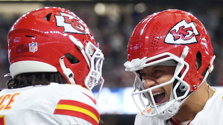 Nov 27, 2025; Arlington, Texas, USA; Kansas City Chiefs wide receiver Rashee Rice (4) and Kansas City Chiefs quarterback Patrick Mahomes (15) celebrate after a play against the Dallas Cowboys during the first quarter at AT&T Stadium. Mandatory Credit: Kevin Jairaj-Imagn Images